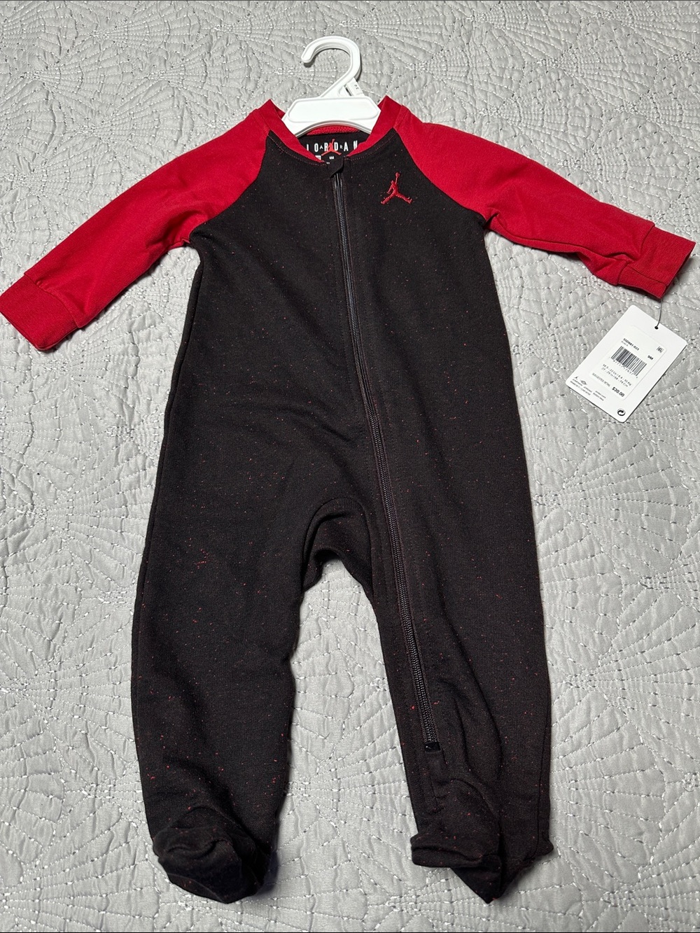 Jordan Black and Red Infant Footed One-Piece, NWT’s, Size 9 Months